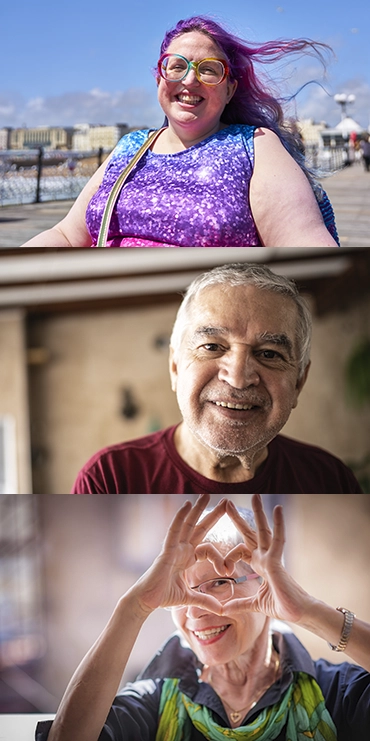A woman smiling and pointing.